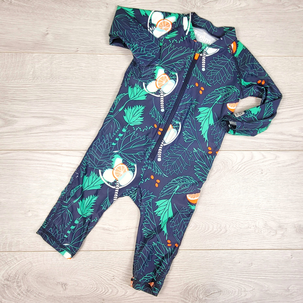 Reima navy patterned sun suit. Size 2-4 months (62)