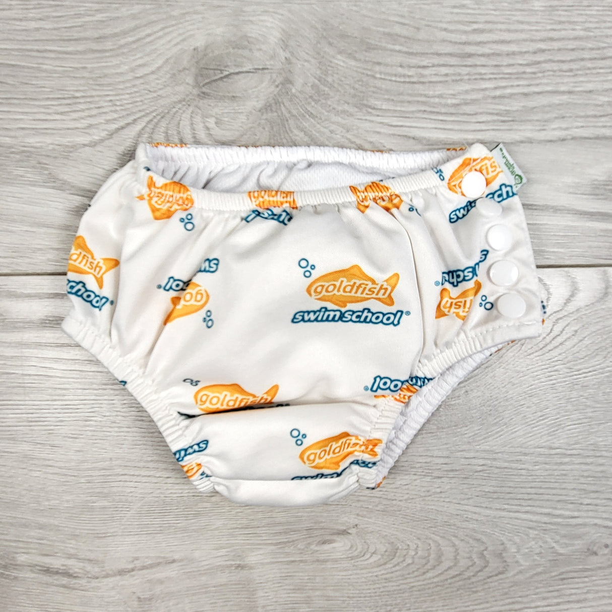 Green Sprouts reusuable swim diaper with fish. Size 24 months