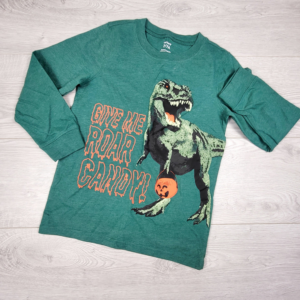 Carters green long sleeve T-Rex top. Size 7