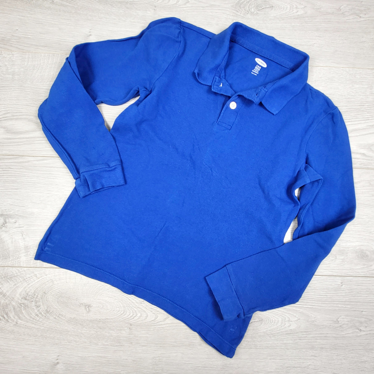 Old Navy blue long sleeve polo shirt. Size 6/7