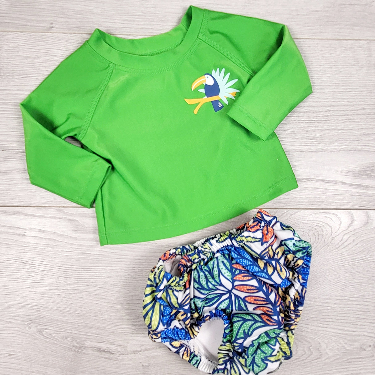 George green rash guard + swim diaper. Size 0-3 months