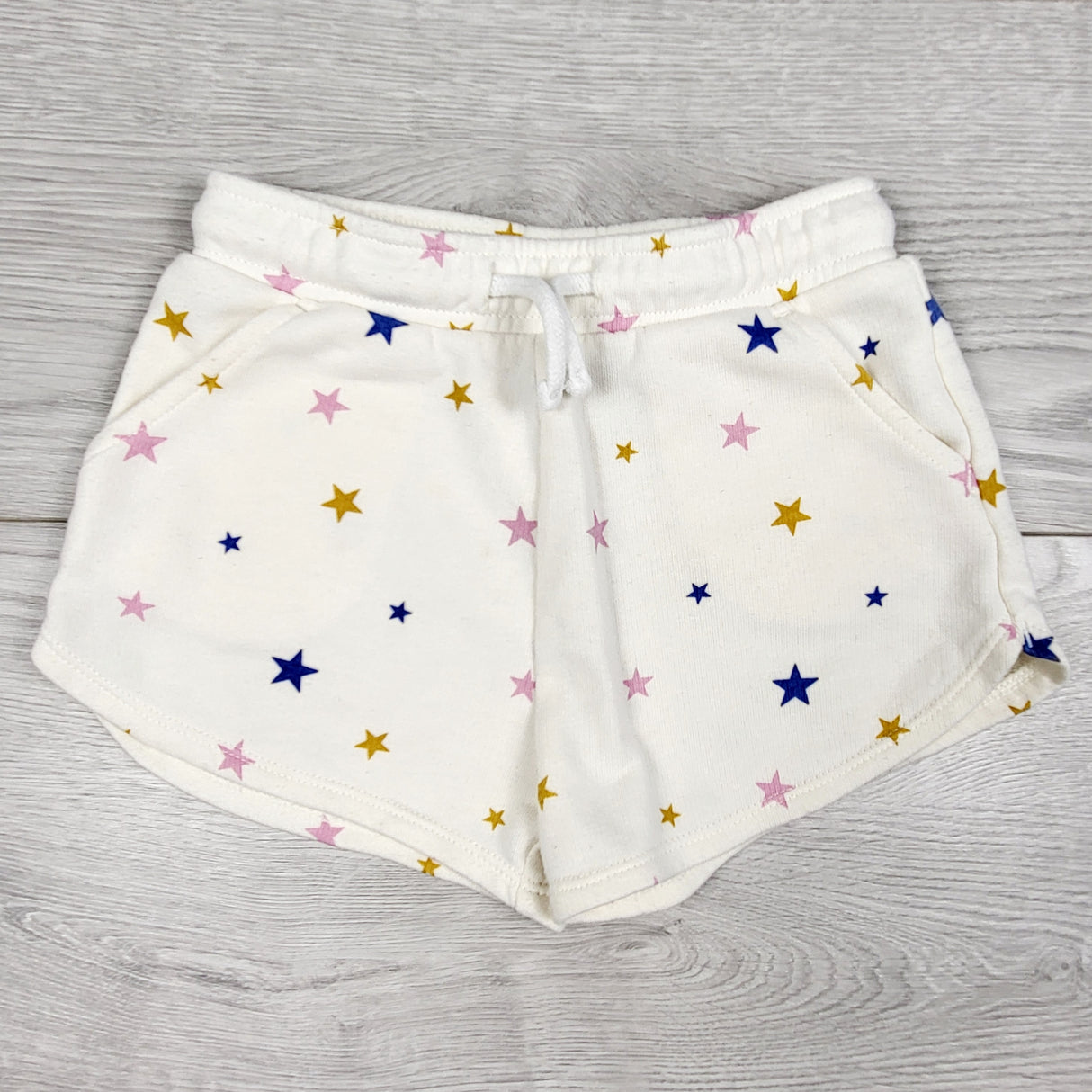 Old Navy white drawstring shorts with stars. Size 2T