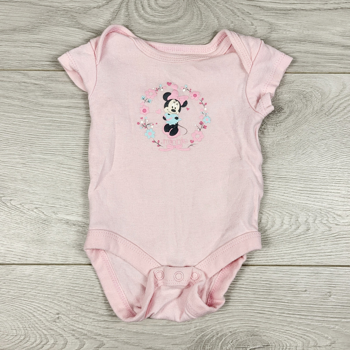 Disney pink Minnie Mouse bodysuit. Newborn size