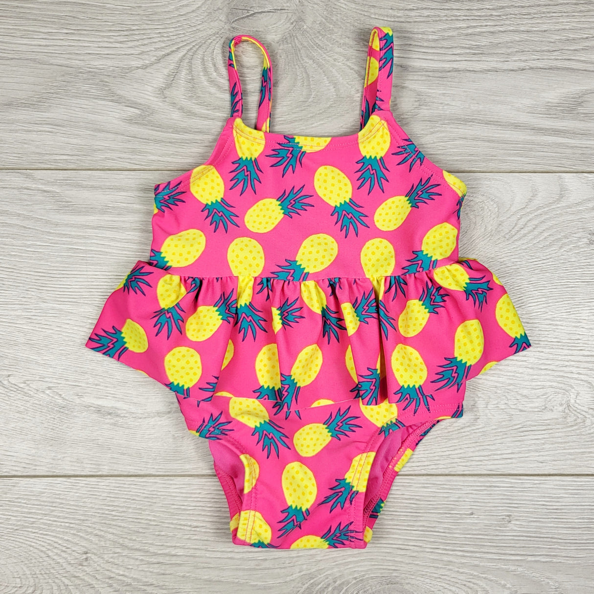 Old Navy pink pineapple print one piece swimsuit. Size 0-3 months