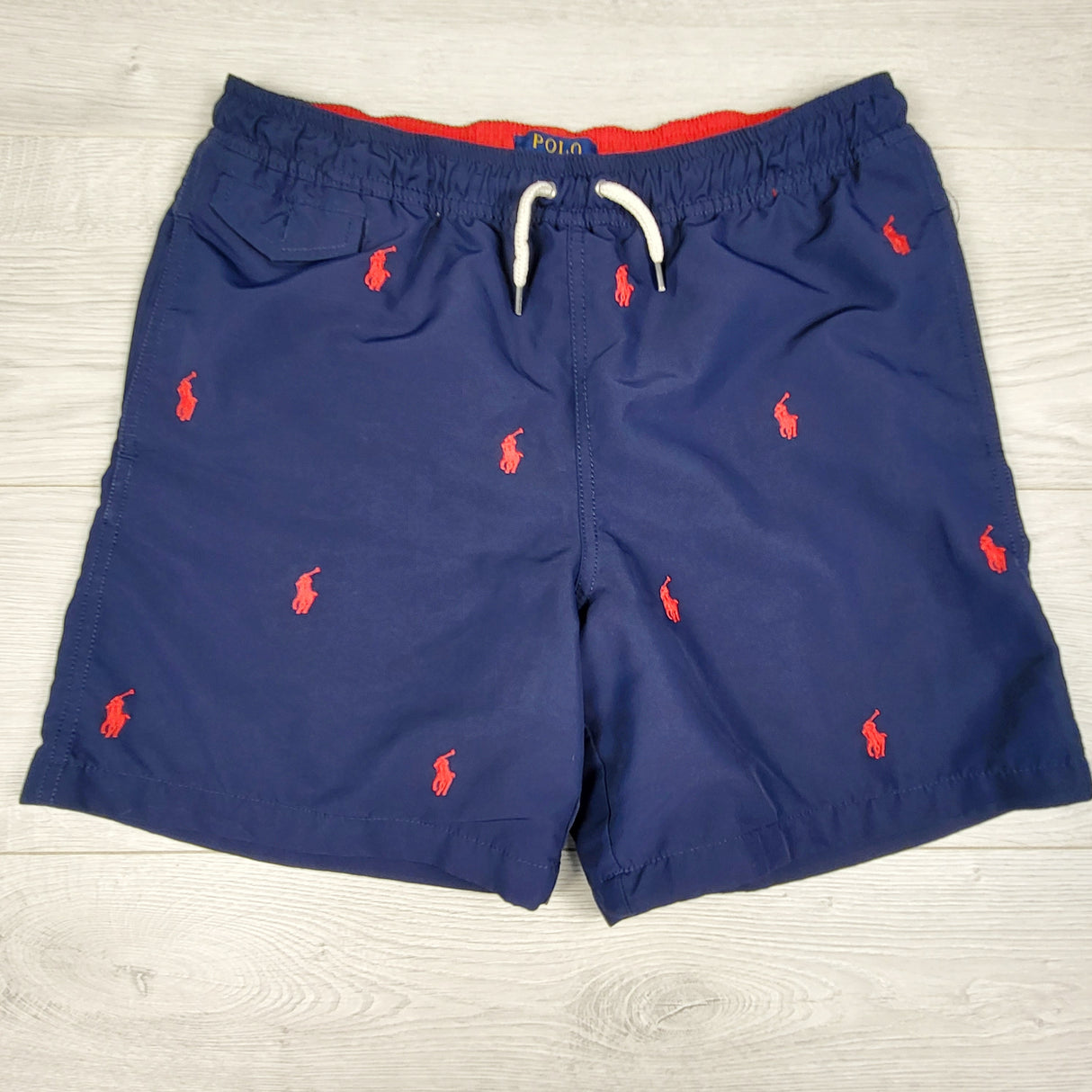 Polo Ralph Lauren navy all over pony print swim shorts. Size 14-16 years