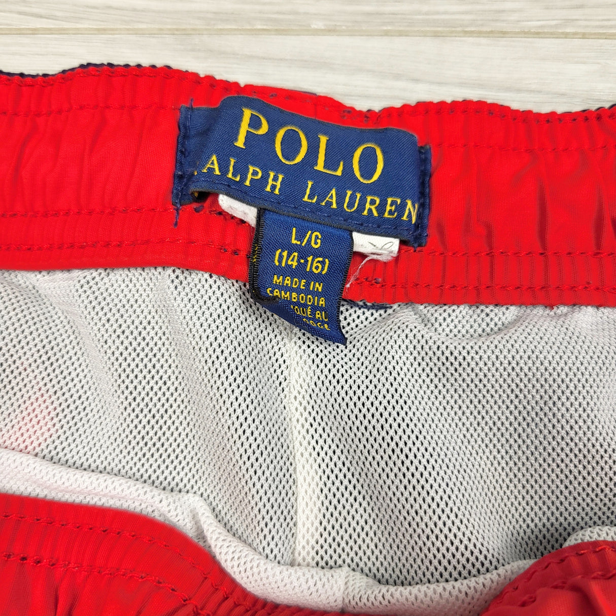 Polo Ralph Lauren navy all over pony print swim shorts. Size 14-16 years