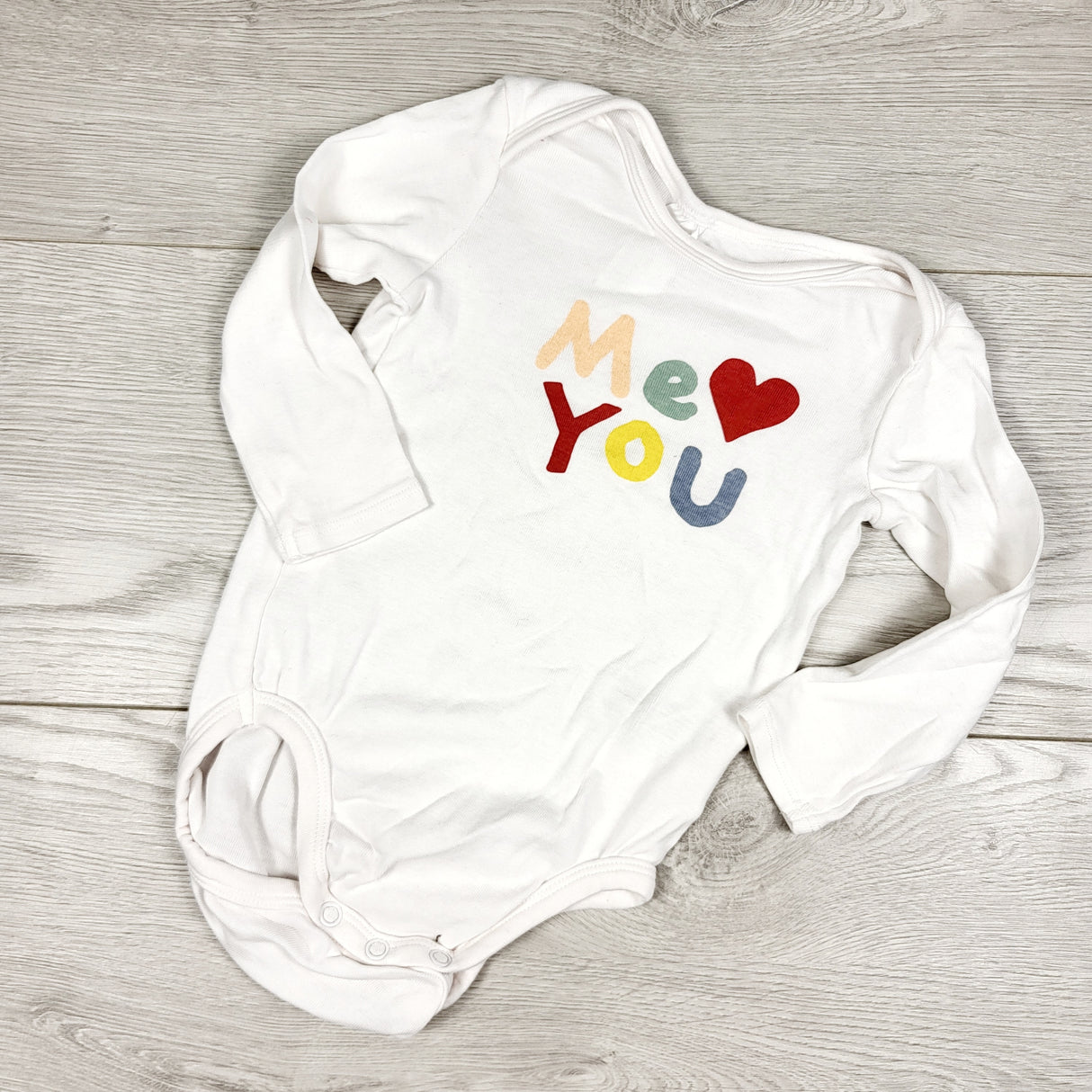 H and M white organic cotton "Me Love You" bodysuit. Size 6-9 months