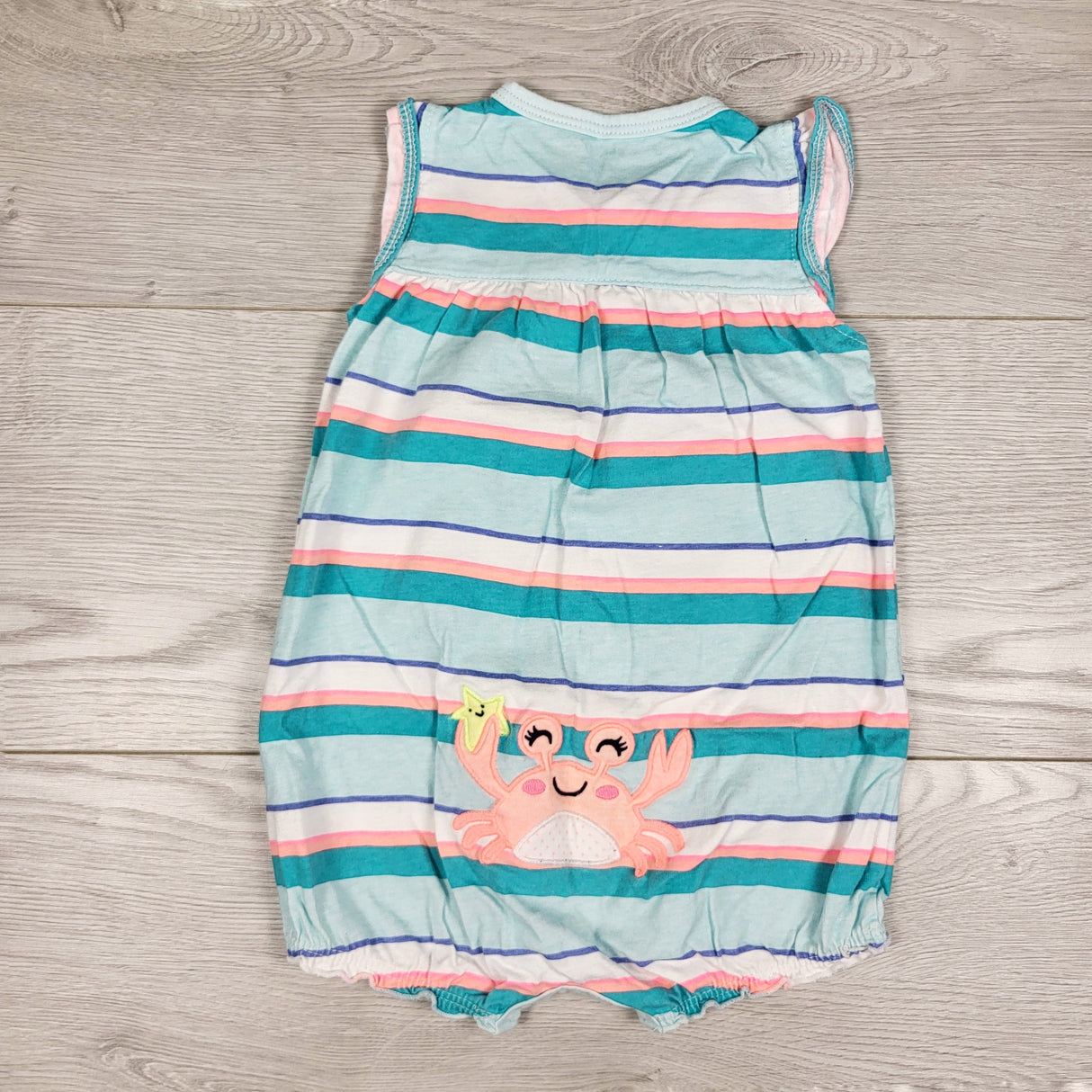 Carters teal striped romper with crab bum. Size 9 months
