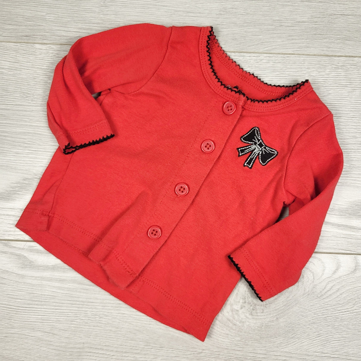 George red button down cotton top with bow. Size 0-3 months