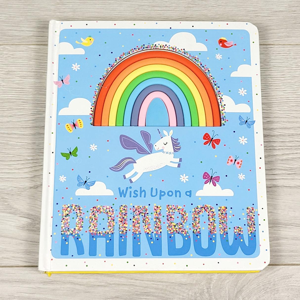 Wish Upon a Rainbow. Touch and feel board book