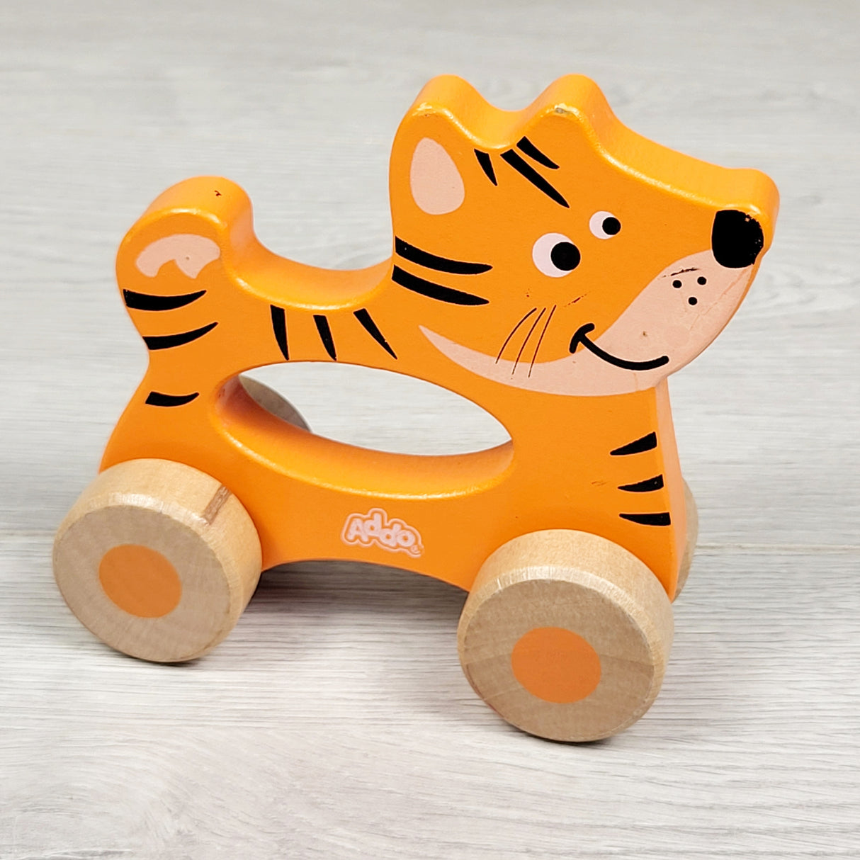 Addo wooden roll along tiger toy