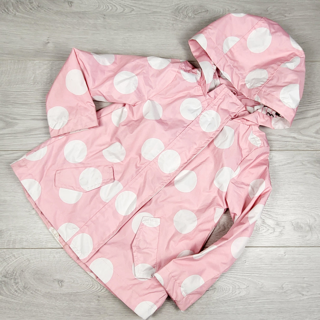 Joe pink polka dot jersey lined hooded rain coat. Size 3T