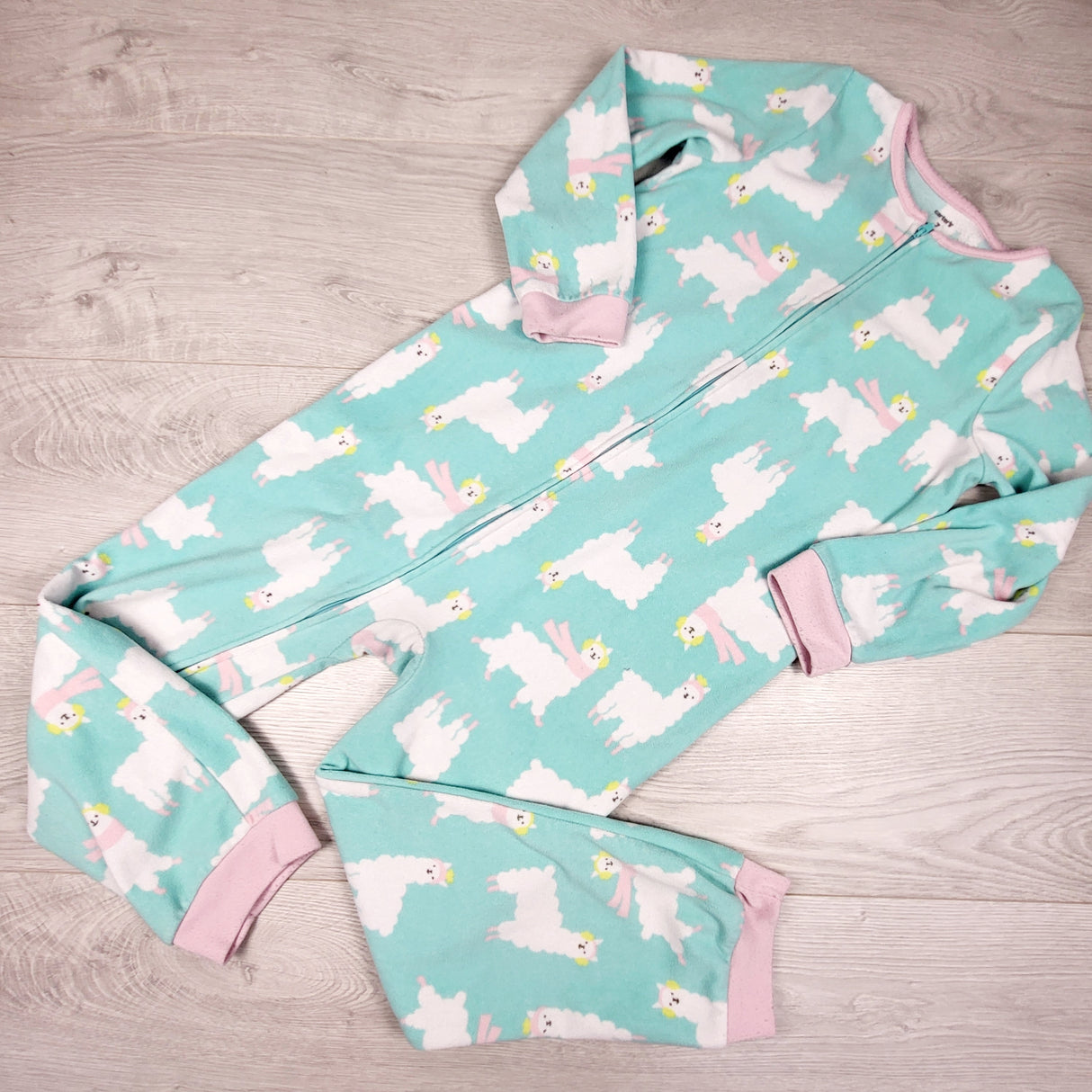Carters turquoise zippered fleece sleeper with llamas. Size 7