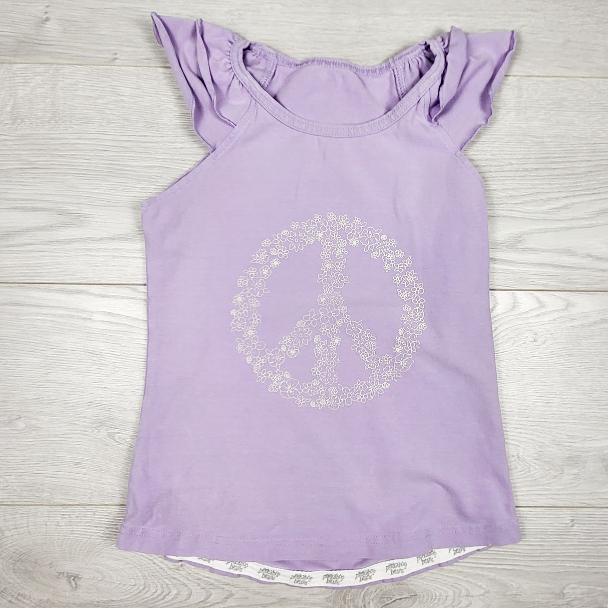 Peekaboo Beans purple top with peace sign. Size 6