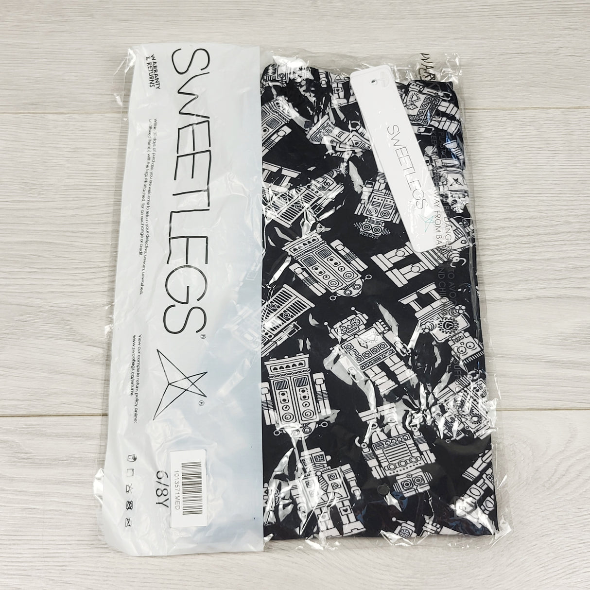 NEW - Sweet Legs with robot print. Size 6-8 Years