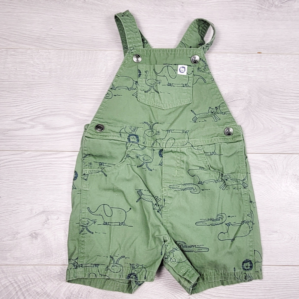 Carters green twill shortalls with animals. Size 24 months