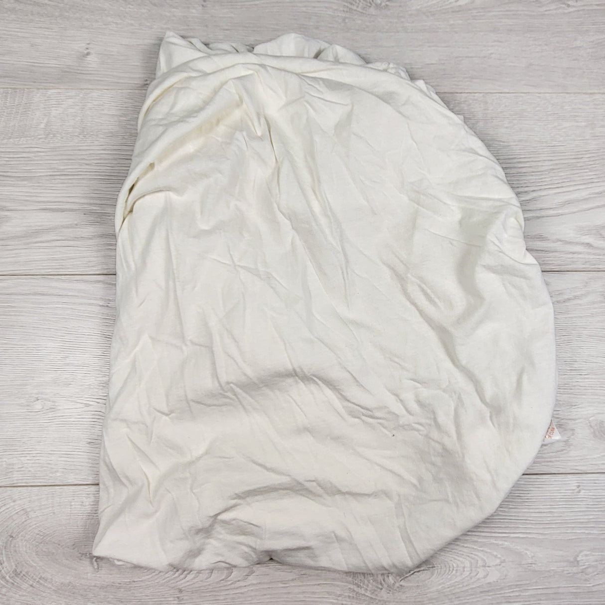 Cream coloured 100% cotton fitted crib sheet