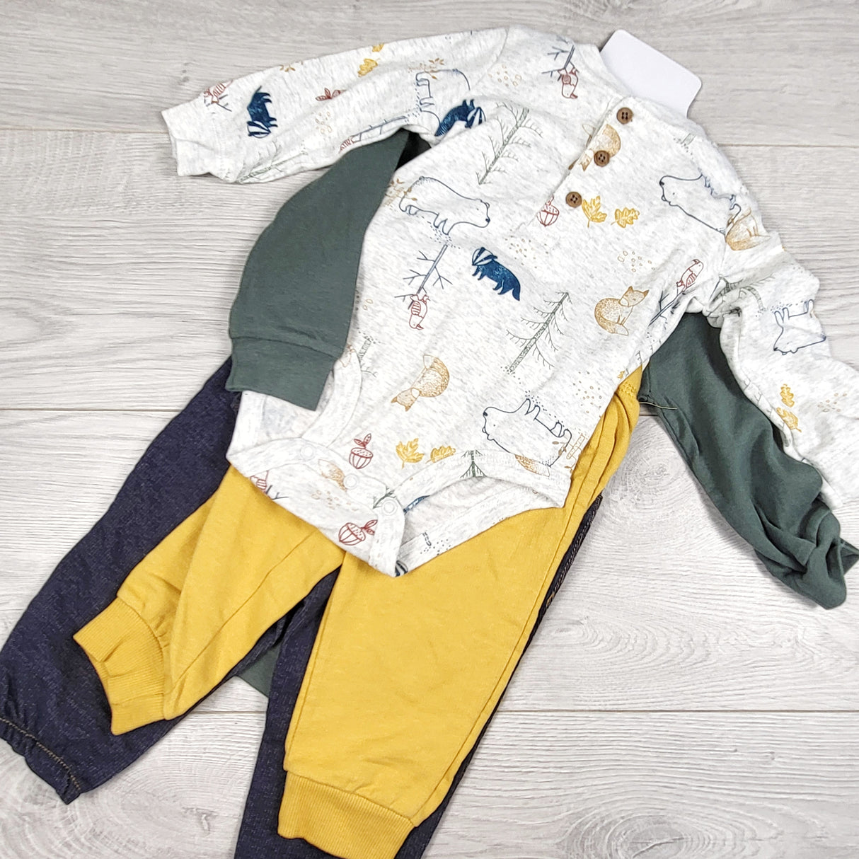 NEW - Carters 4pc set. Size 9 months