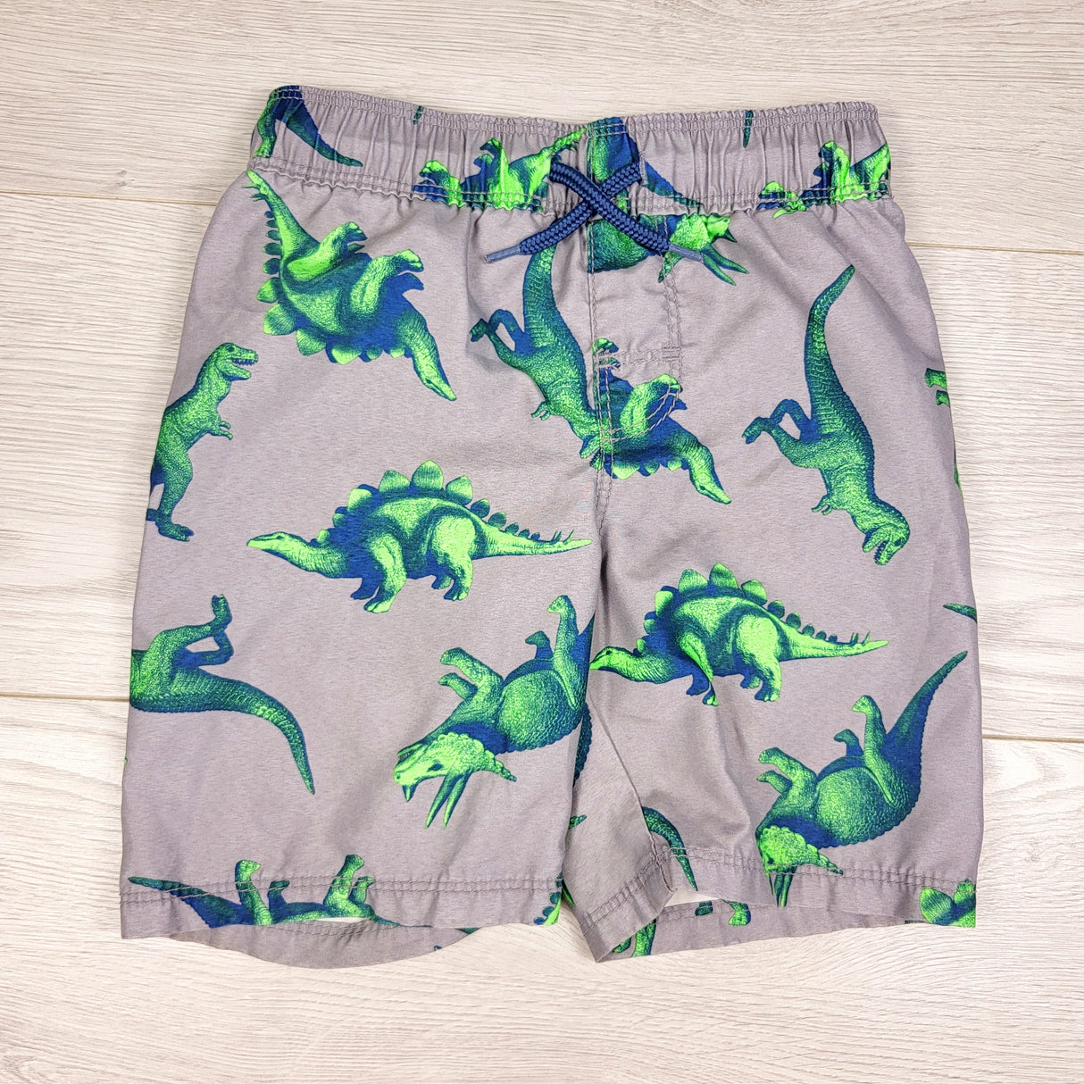 Old Navy grey dinosaur print swim shorts. Size 3T