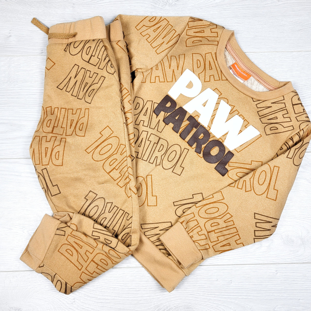 Tan paw Patrol 2pc sweat suit. Size 4T