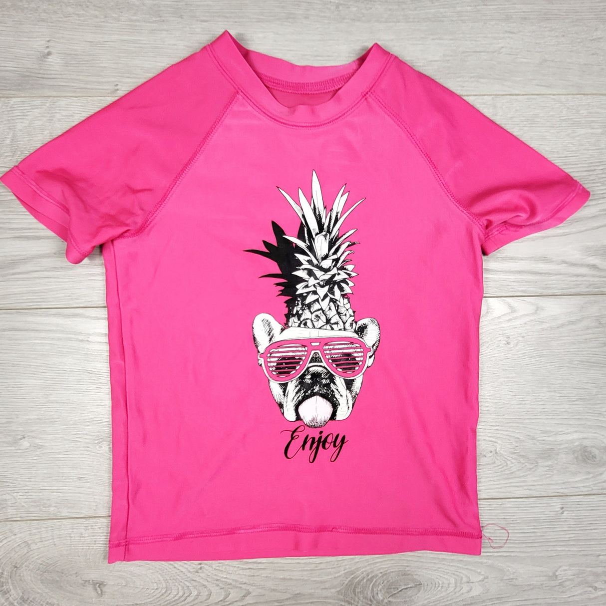 George pink rash guard with dog + pineapple. Size 10/12