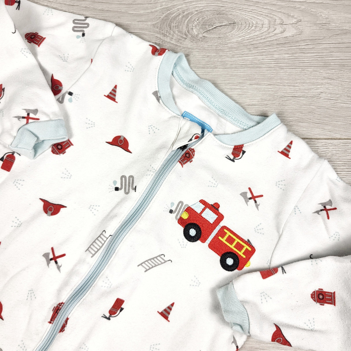 Tuffy white zippered sleeper with fire truck. Size 18 months