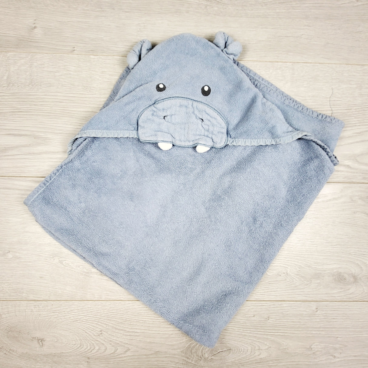 Blue hooded towel with hippo