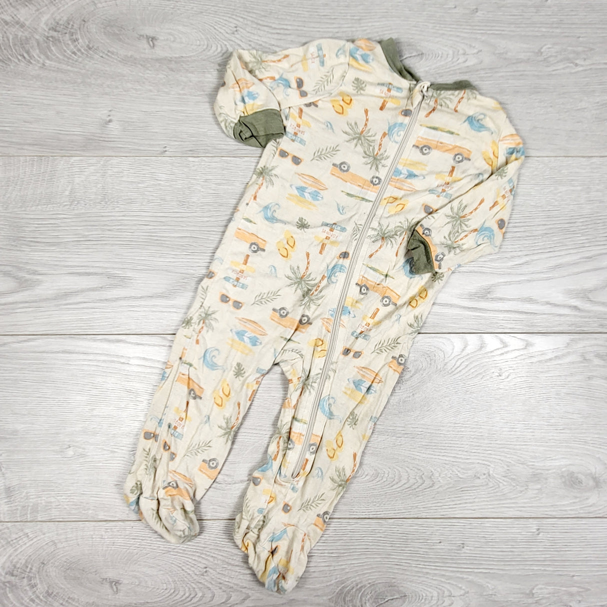 Milkberry zippered bamboo sleeper with surf theme. Size 0-3 months