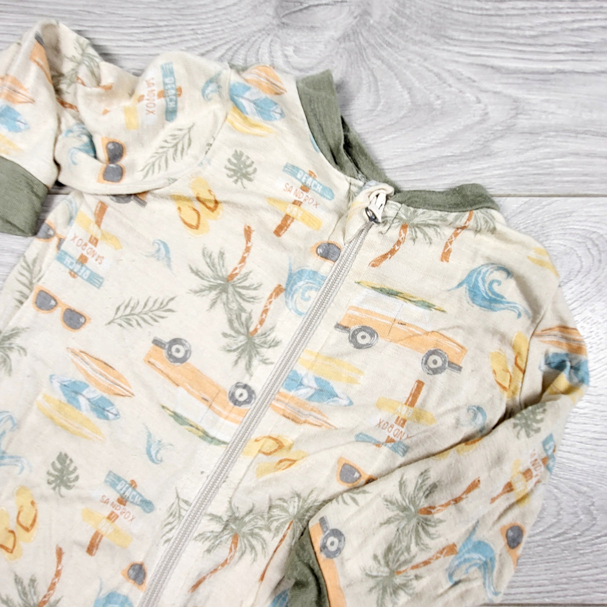 Milkberry zippered bamboo sleeper with surf theme. Size 0-3 months