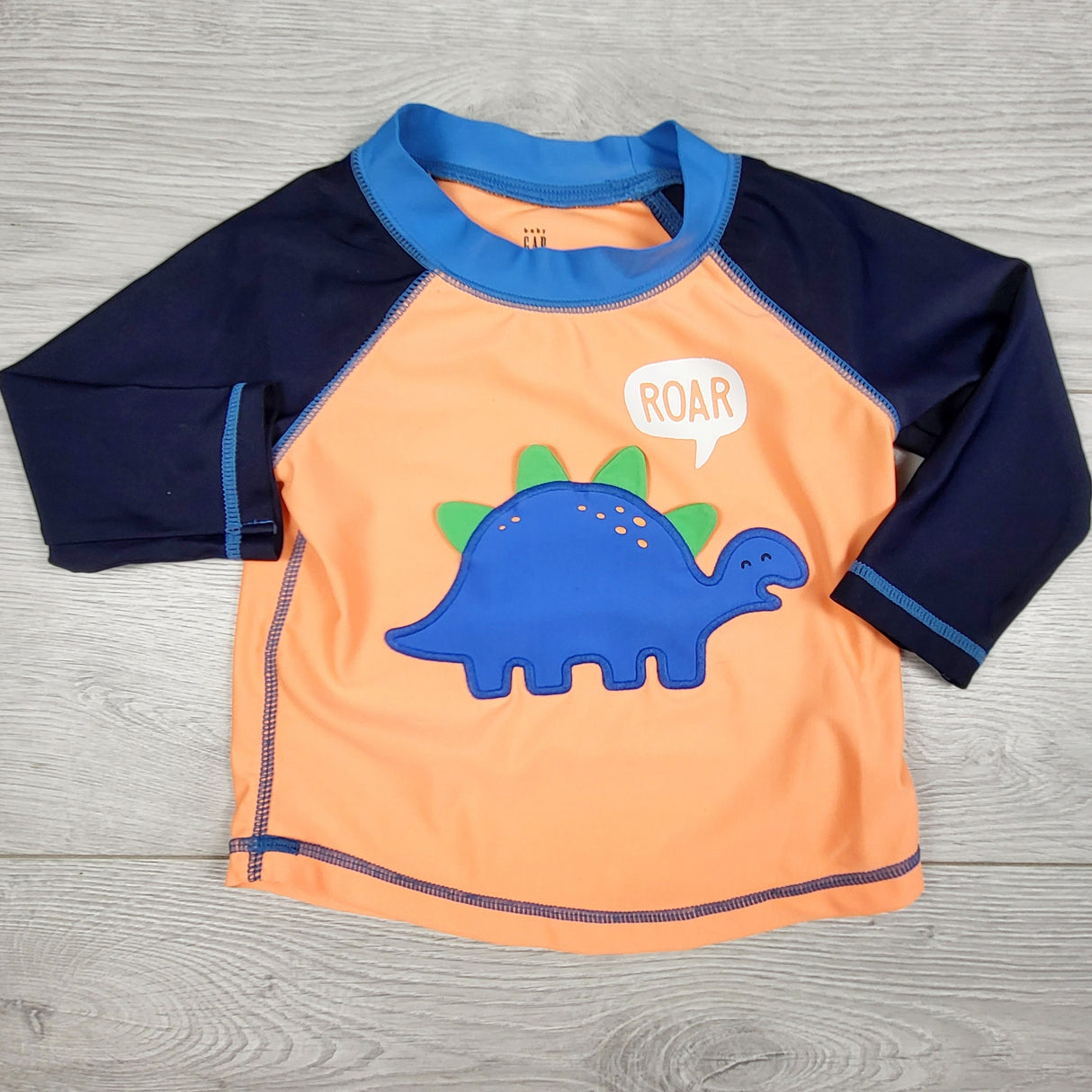 Gap navy and orange dinosaur rash guard. Size 6-12 months