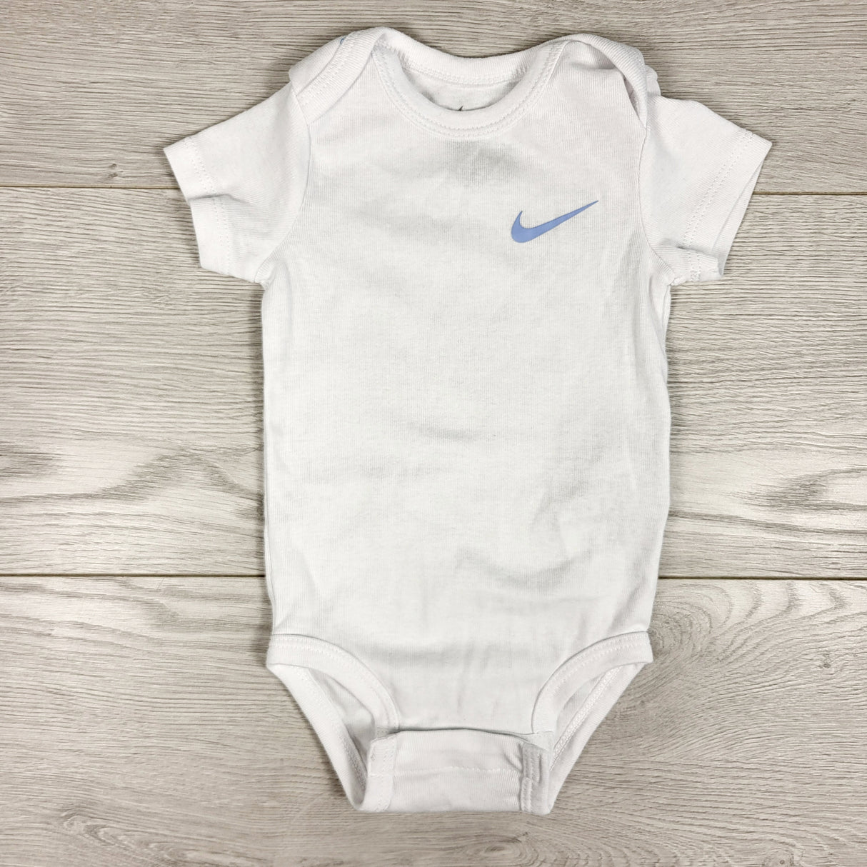 White Nike bodysuit. Size 9 months