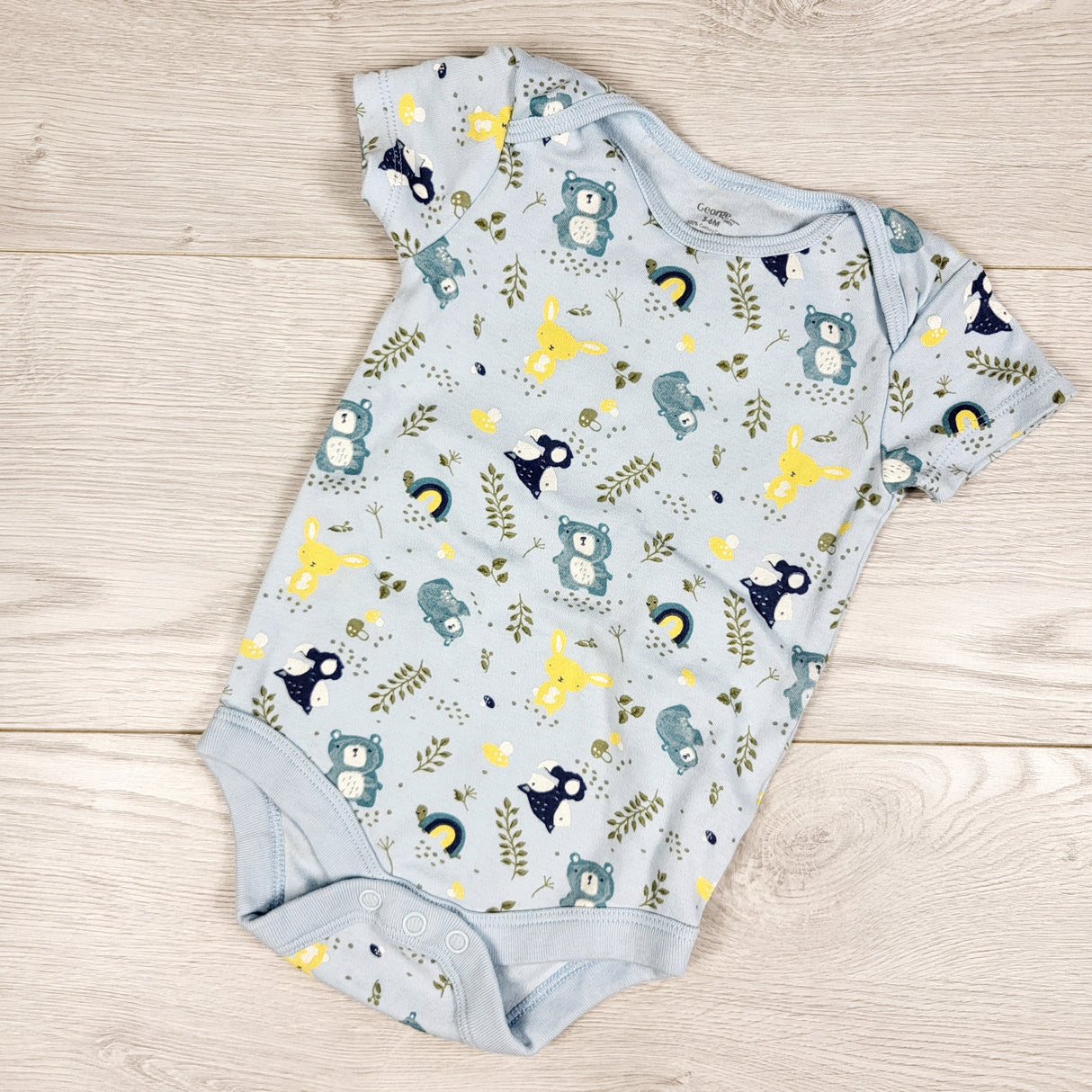 George blue woodland animals bodysuit. Size 3-6 months