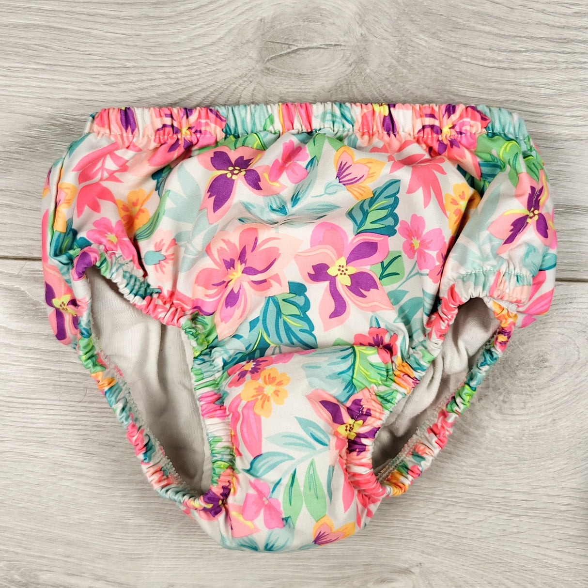 Sea Me Swim floral print reusable swim diaper. Size 12-18 months