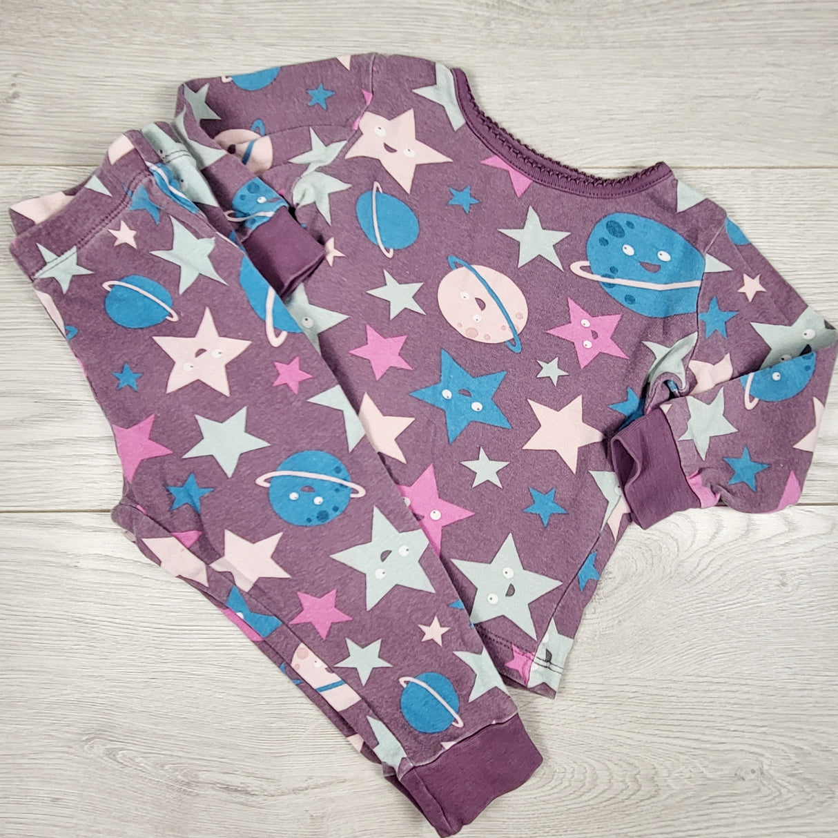 George purple 2pc space themed PJs. Size 12-18 months