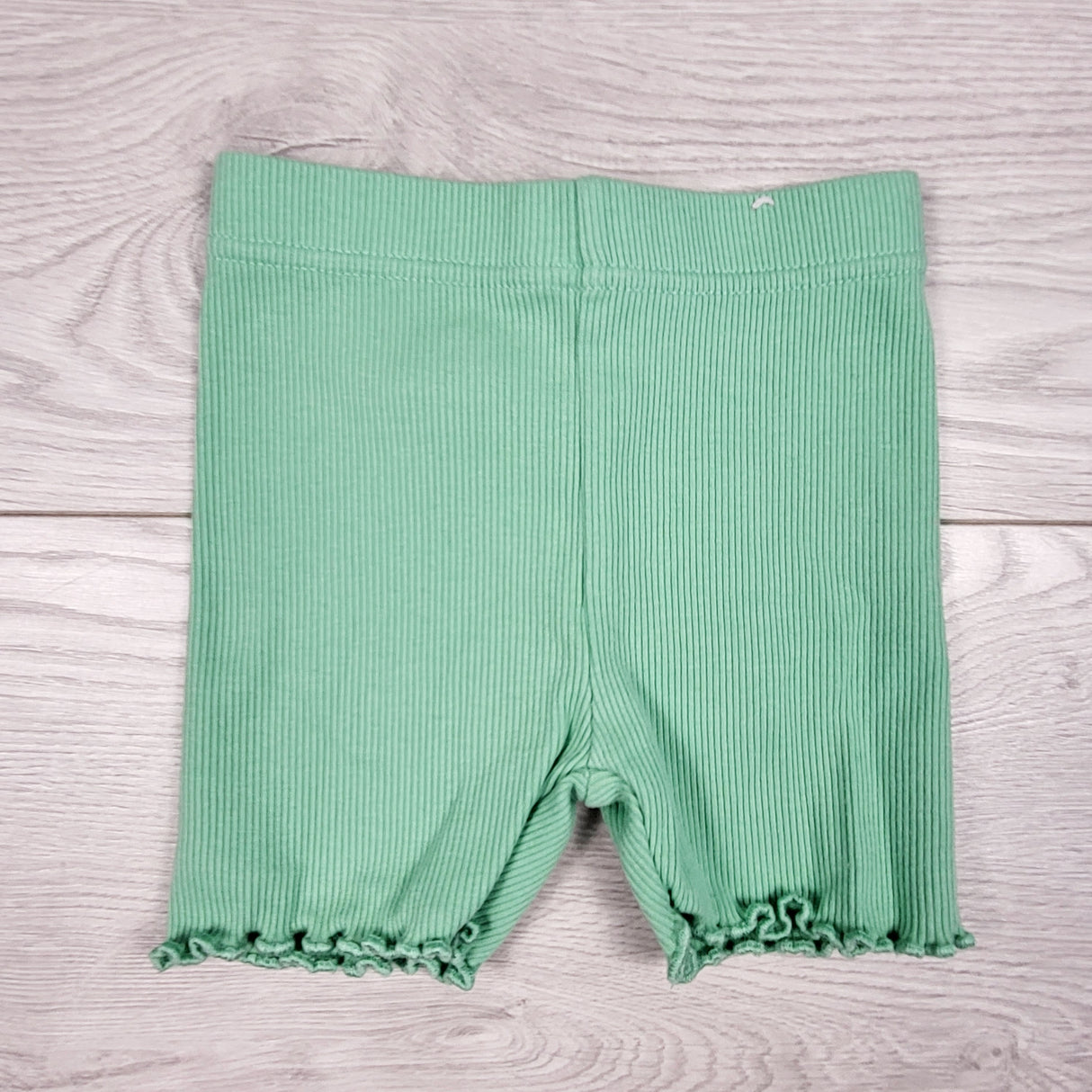 Garanimals green ribbed bicycle shorts. Size 18 months
