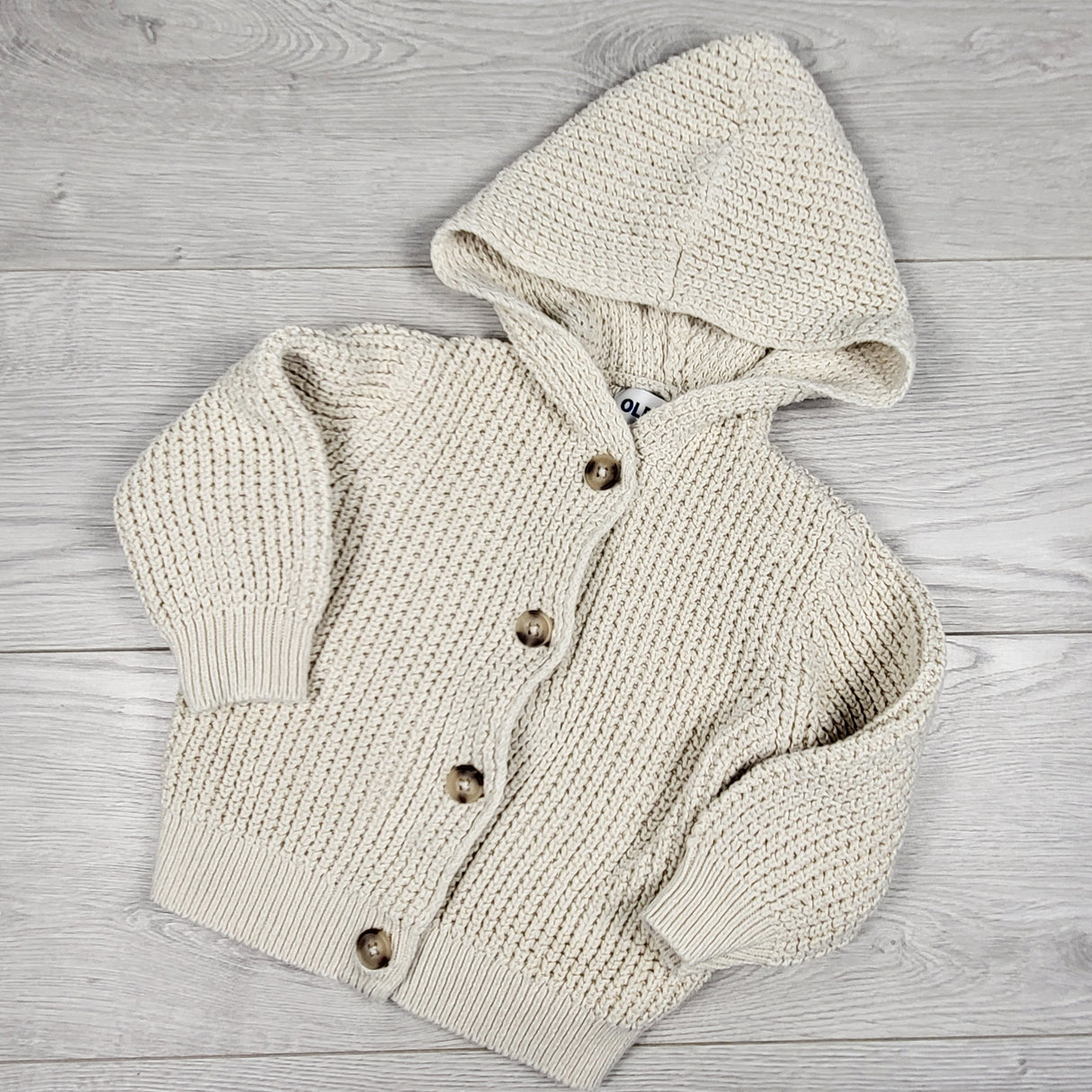 Old Navy off white hooded waffle sweater. Size 18-24 months