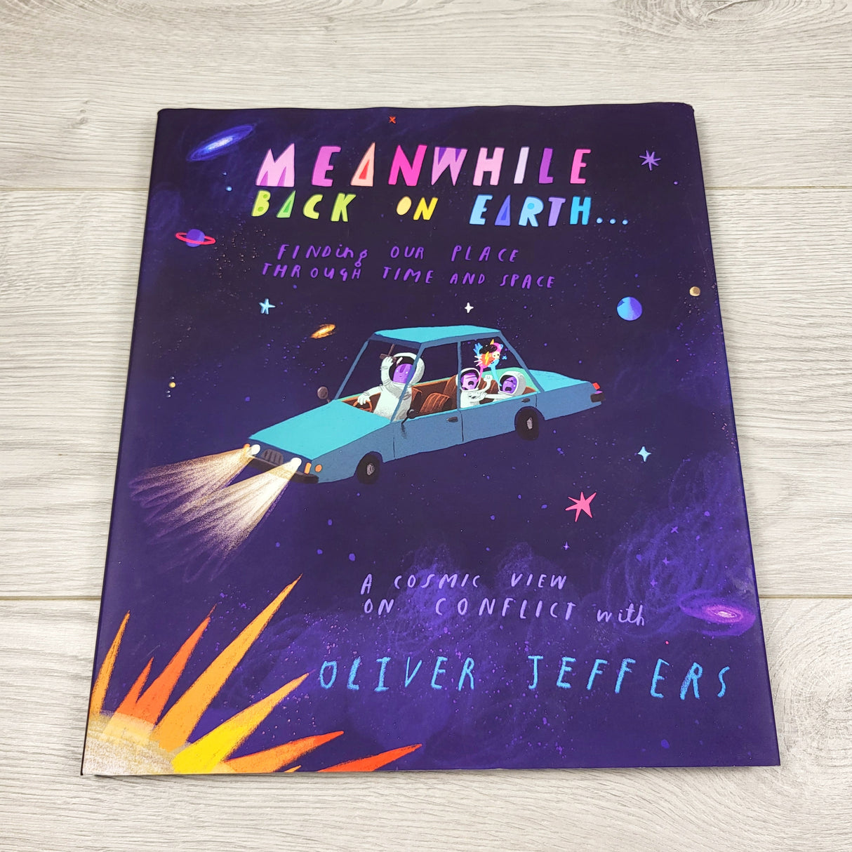 Meanwhile Back on Earth. Hardcover book