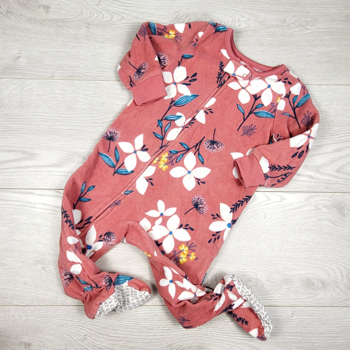 Carters pink floral print zippered fleece sleeper. Size 9 months