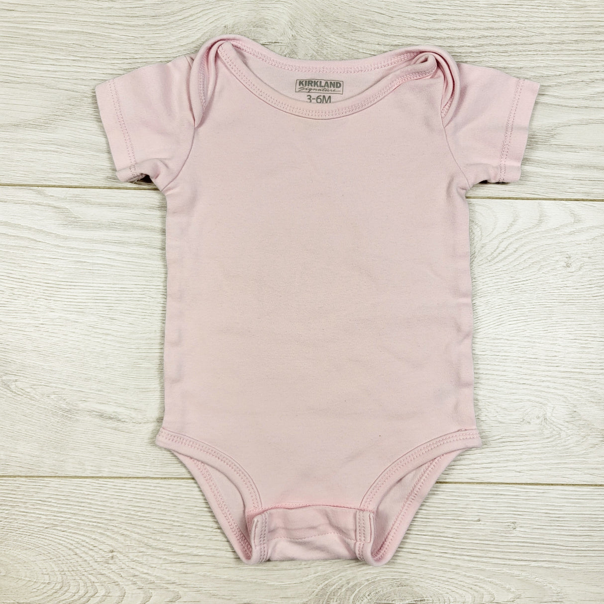 Kirkland pink bodysuit. Size 3-6 months