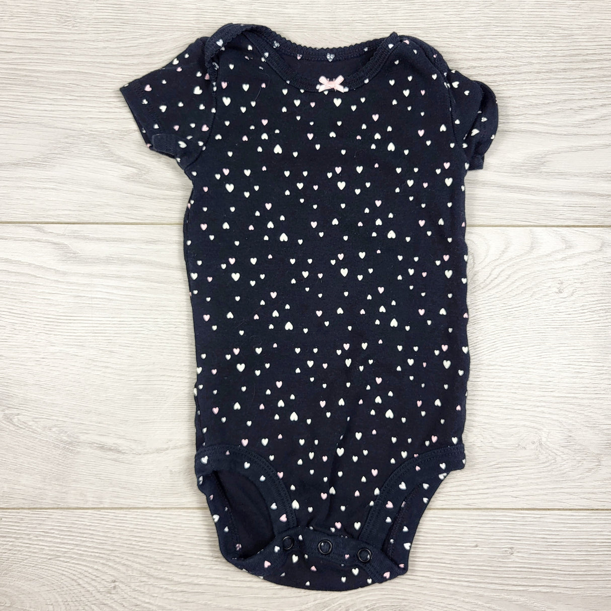 Carters black bodysuit with hearts. Size 6 months
