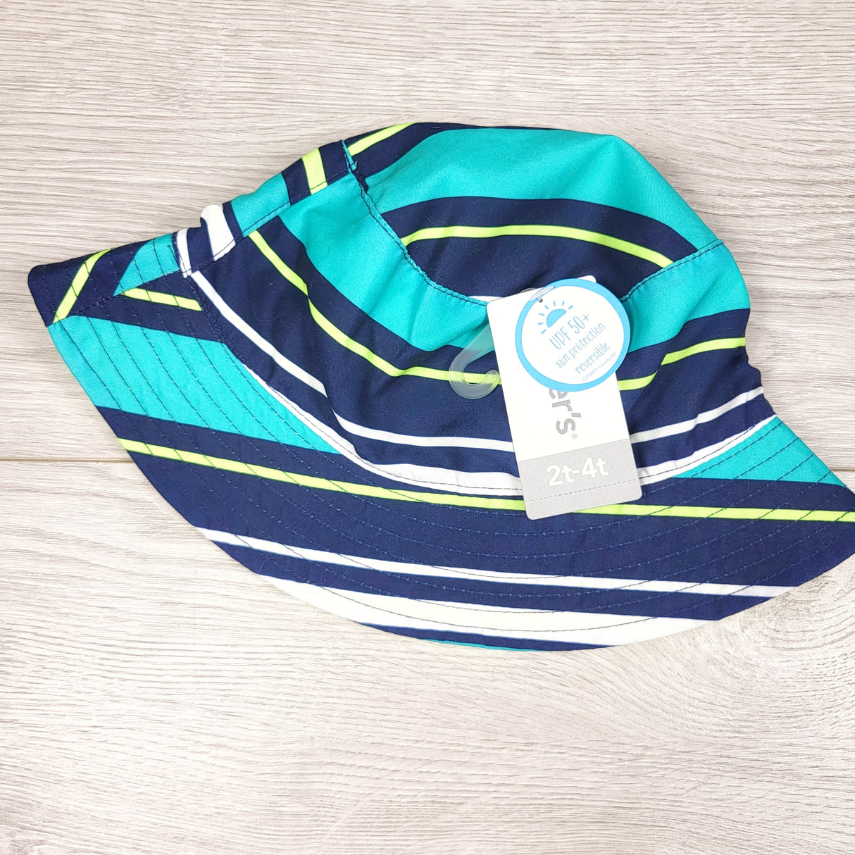 NEW - Carters reversible bucket hat with stripes. Size 2-4T
