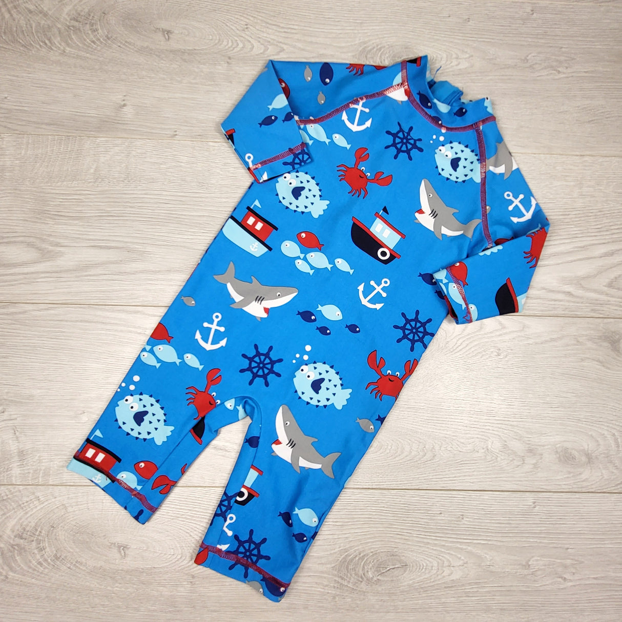 Marks and Spencer blue one piece rash guard. Size 18-24 months