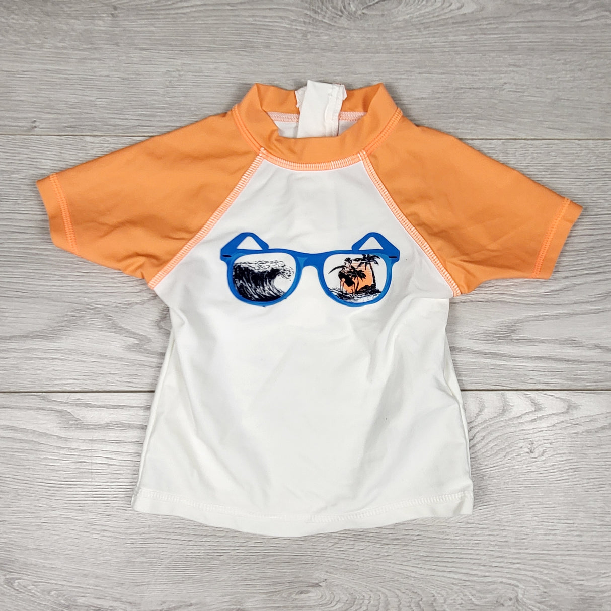 Joe white and orange rash guard with sunglasses. Size 3-6 months