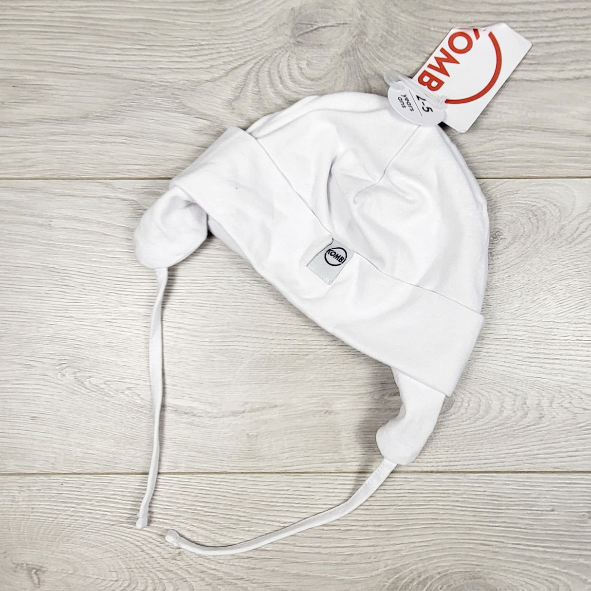 NEW - Kombi white hat with ear flaps. Size 2-5T