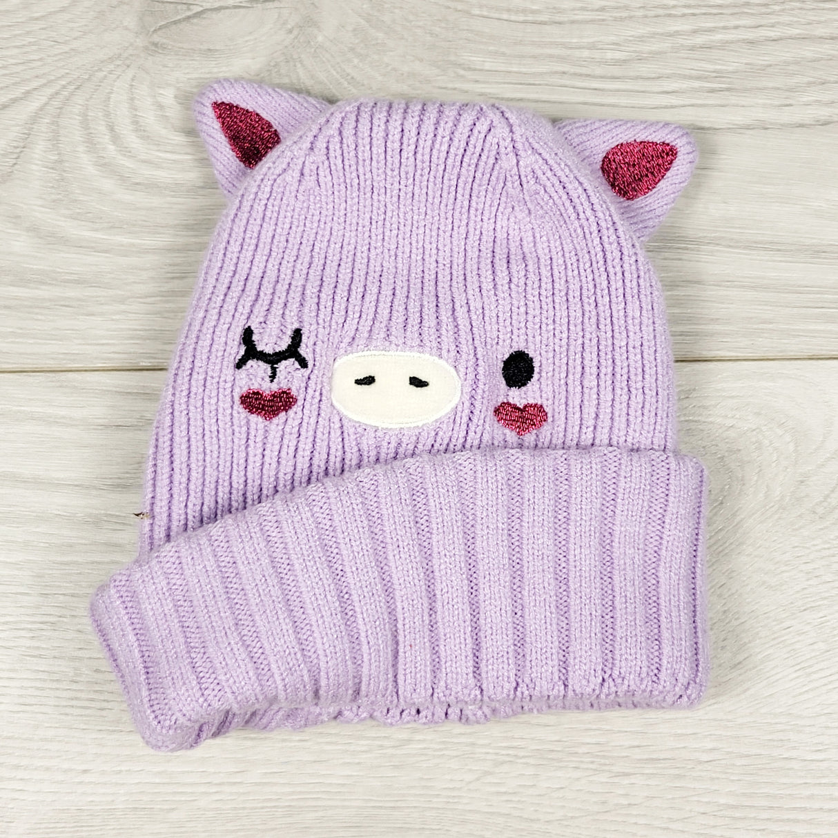 Joe purple toque with pig. Approx 1-3 Years
