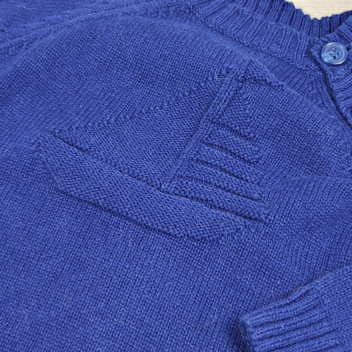 Joe blue sweater with embossed sailboat. Size 6-12 months
