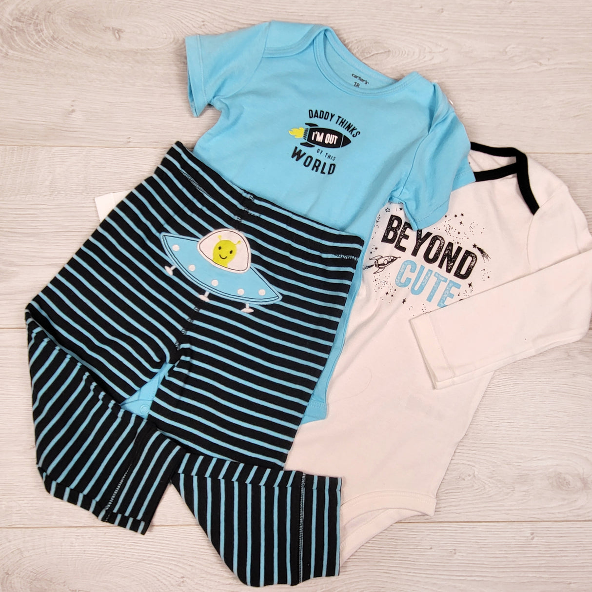NEW - Carters 3pc set with space theme. Size 18 months