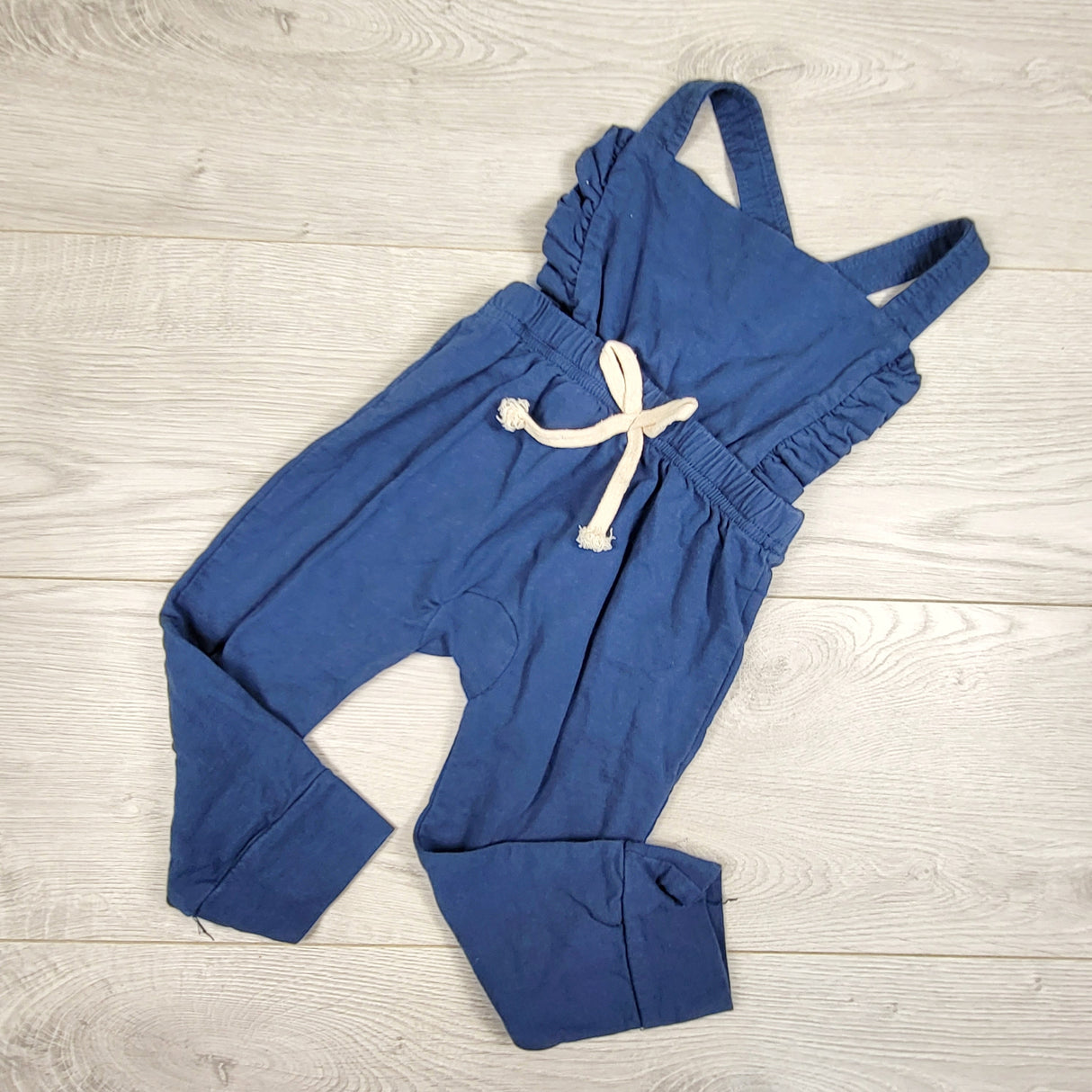 Blue overalls with ruffles. Approx 2T