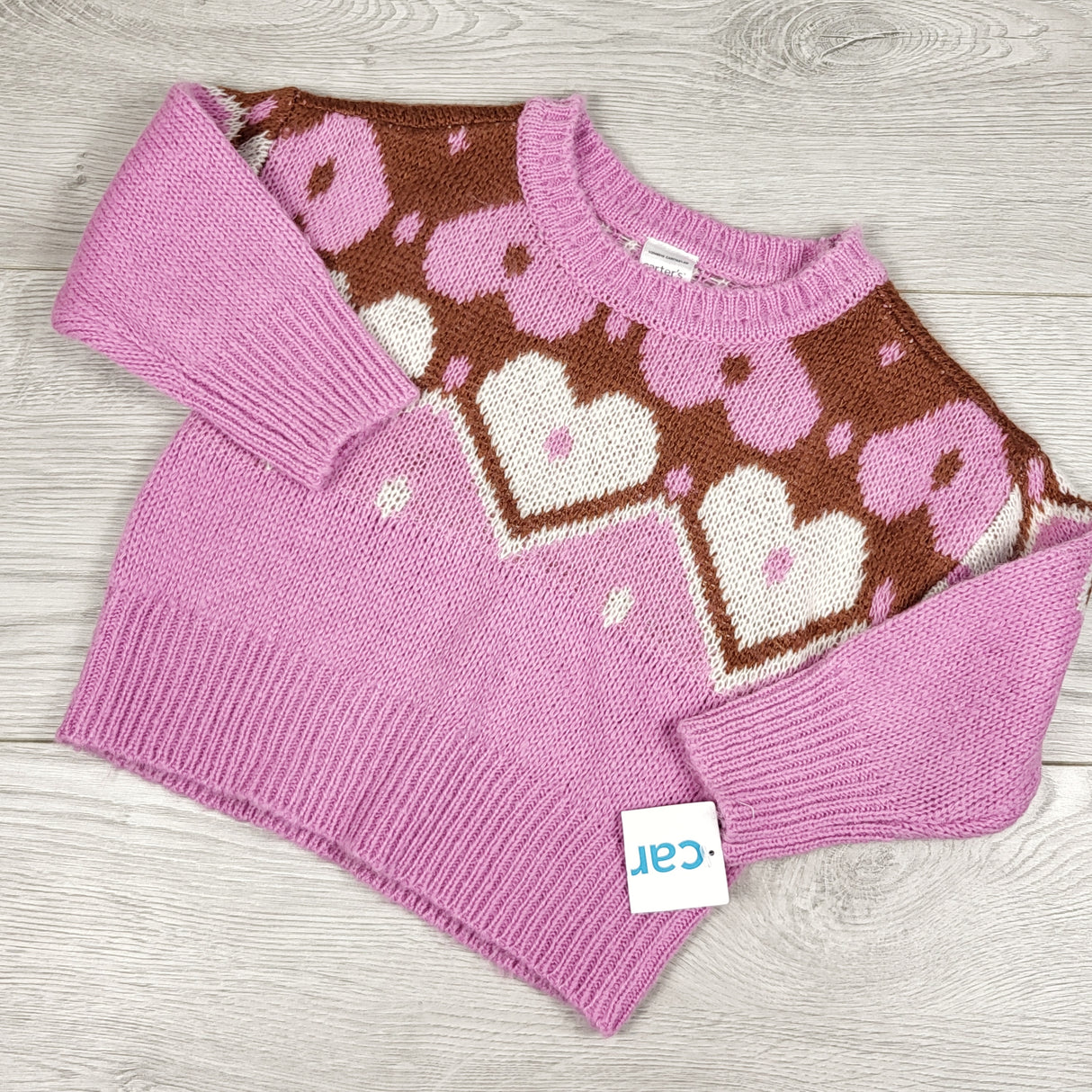 NEW - Carters pink sweater with hearts. Size 12 months