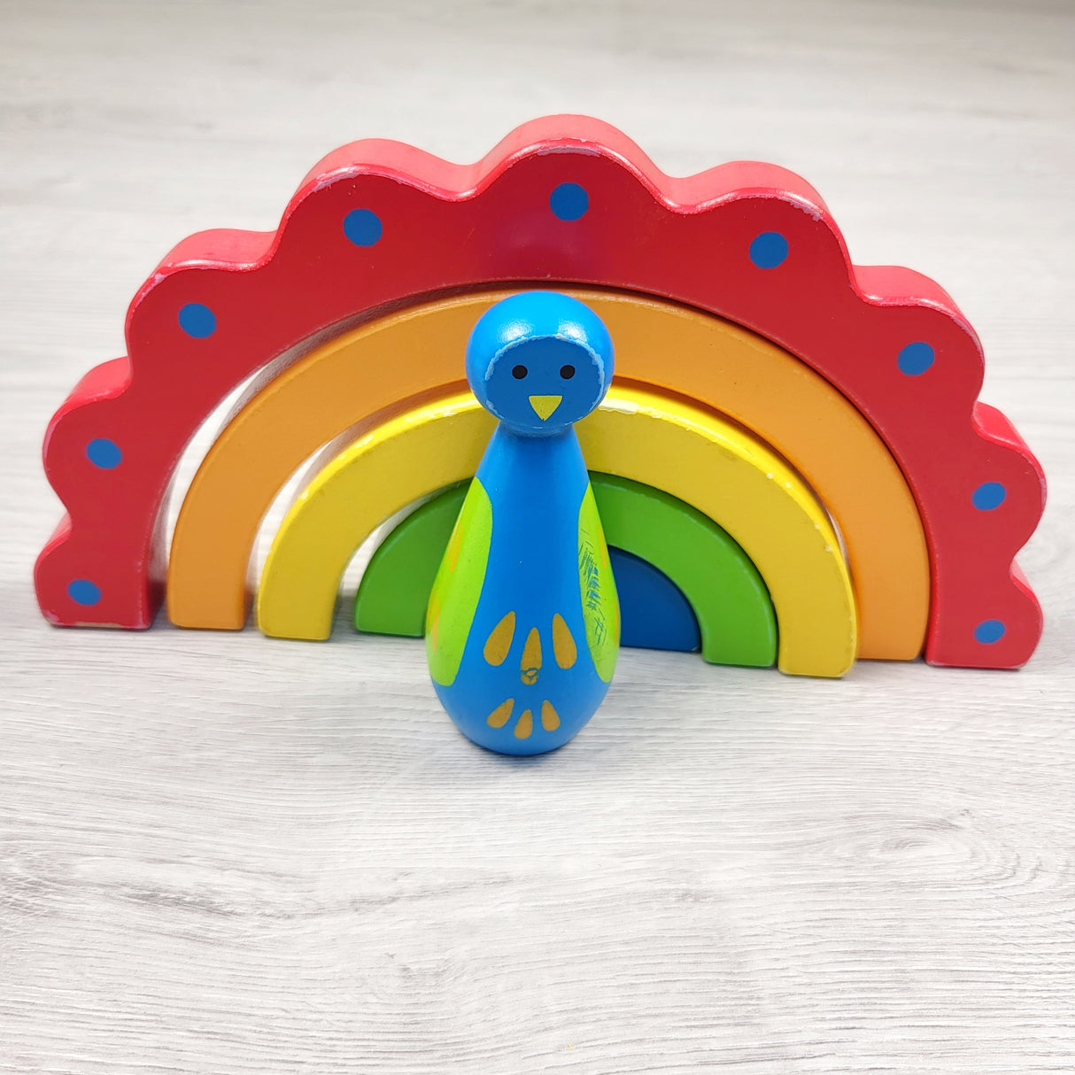 Hape Peacock Curves wooden stacking toy